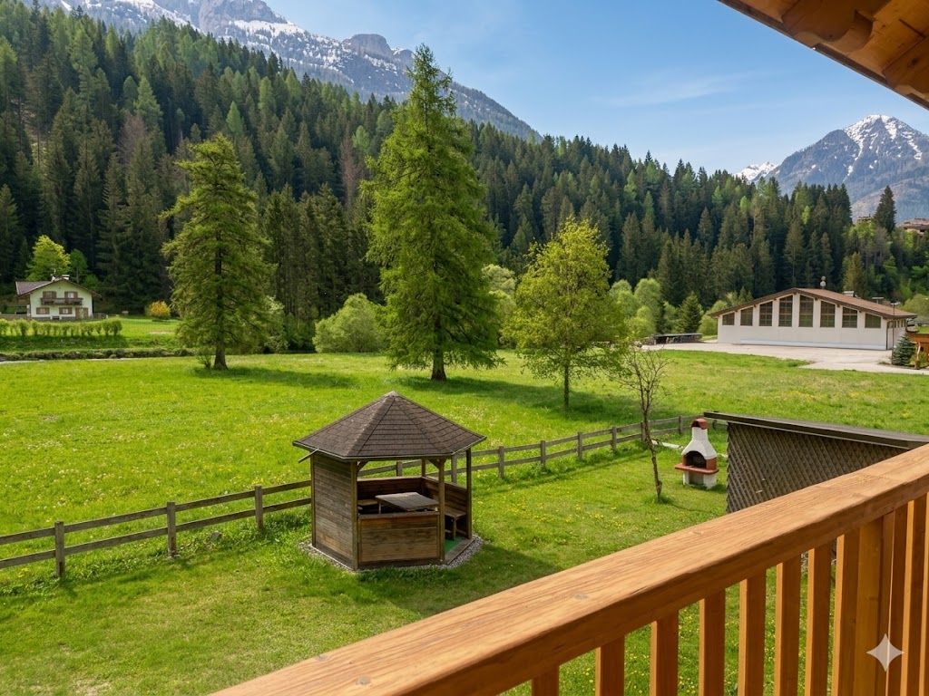 Vista panoramica dal balcone sulla Val di Fassa con gazebo e montagne - Ciasa Le Giare